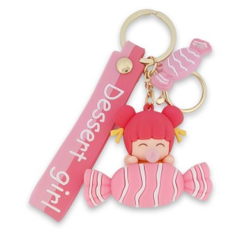 Porte-clés petite fille sur un gros bonbon