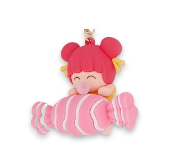 Porte-clés petite fille sur un gros bonbon