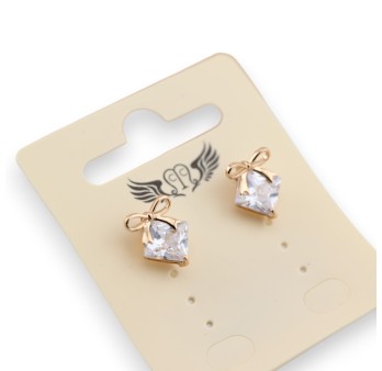 Boucle d'oreille fantaisie dorée pierre brillante noeud