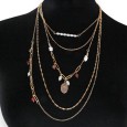 Collier fantaisie doré 5 rangées perles grena et blanches