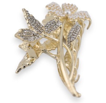 Pince à cheveux dorée fleur sur sa tige en perle et strass