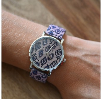 Montre Ernest imprimée feuilles bleues sur fond rose