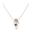 Collier médaillon géométrique design doré de chez Ikita