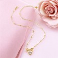 Collier nœud papillon cœur Acier doré
